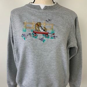 gray crewneck with embroidered animals